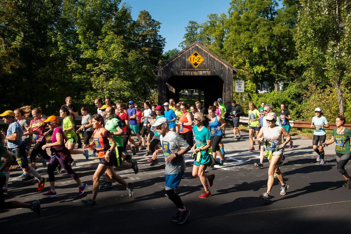 Racers set out from the Burkeville Covered Bridge on a bright sunny morning